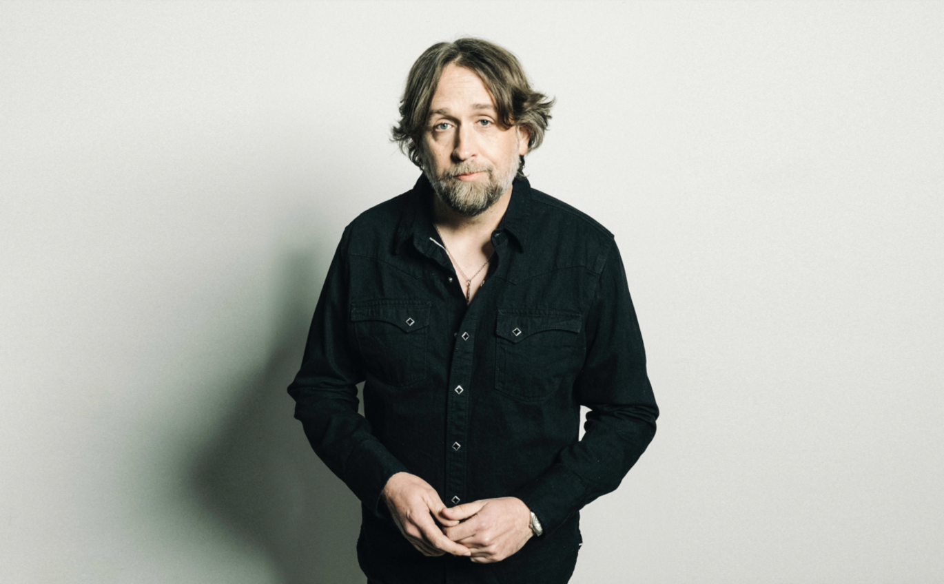 Hayes Carll’s “Progress Of Man (Bitcoin & Cattle)” Is A Humorous But Sobering Commentary On Selfishness