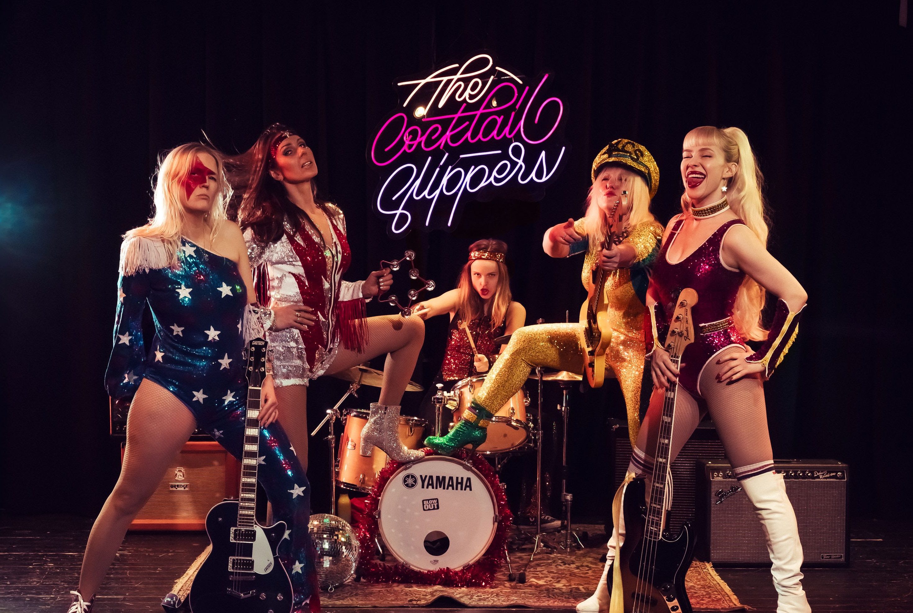 The Cocktail Slippers Celebrate Being “Back Where You Belong” On Stage